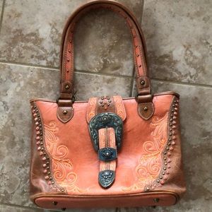 Montana West purse stylish in excellent condition with concealed weapon section